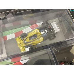 Panini Formula 1 The Car Collection - twelve die-cast models including ten in unopened packaging with periodical; all models in plastic display boxes; and eight other boxed die-cast models of racing cars by Corgi, Onyx, Classico, Minichamps etc (20)