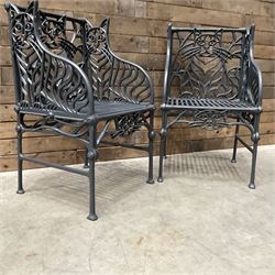 Richard Bawden (1936-2024): Pair of Cat design painted cast iron garden armchairs