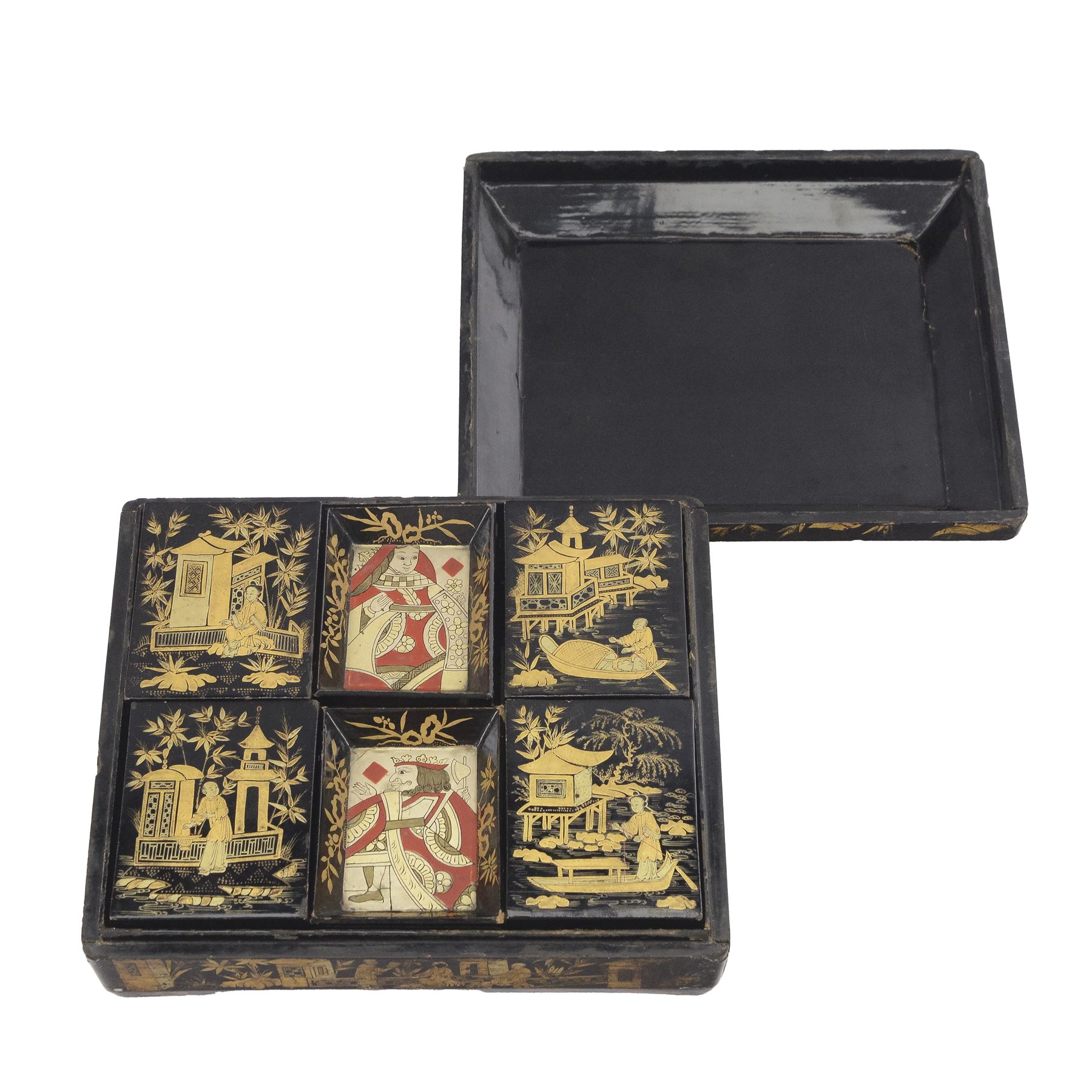 19th century Chinese export black lacquered games box, of rectangular form decorated to the exterior with figures, pagodas and bridges in a riverside landscape in red and gilt, the lift off cover opening to reveal a compartmented interior with four removable covered boxes decorated with conforming figural scenes, and eight trays decorated with stylised suits, H10cm W30cm D27cm
