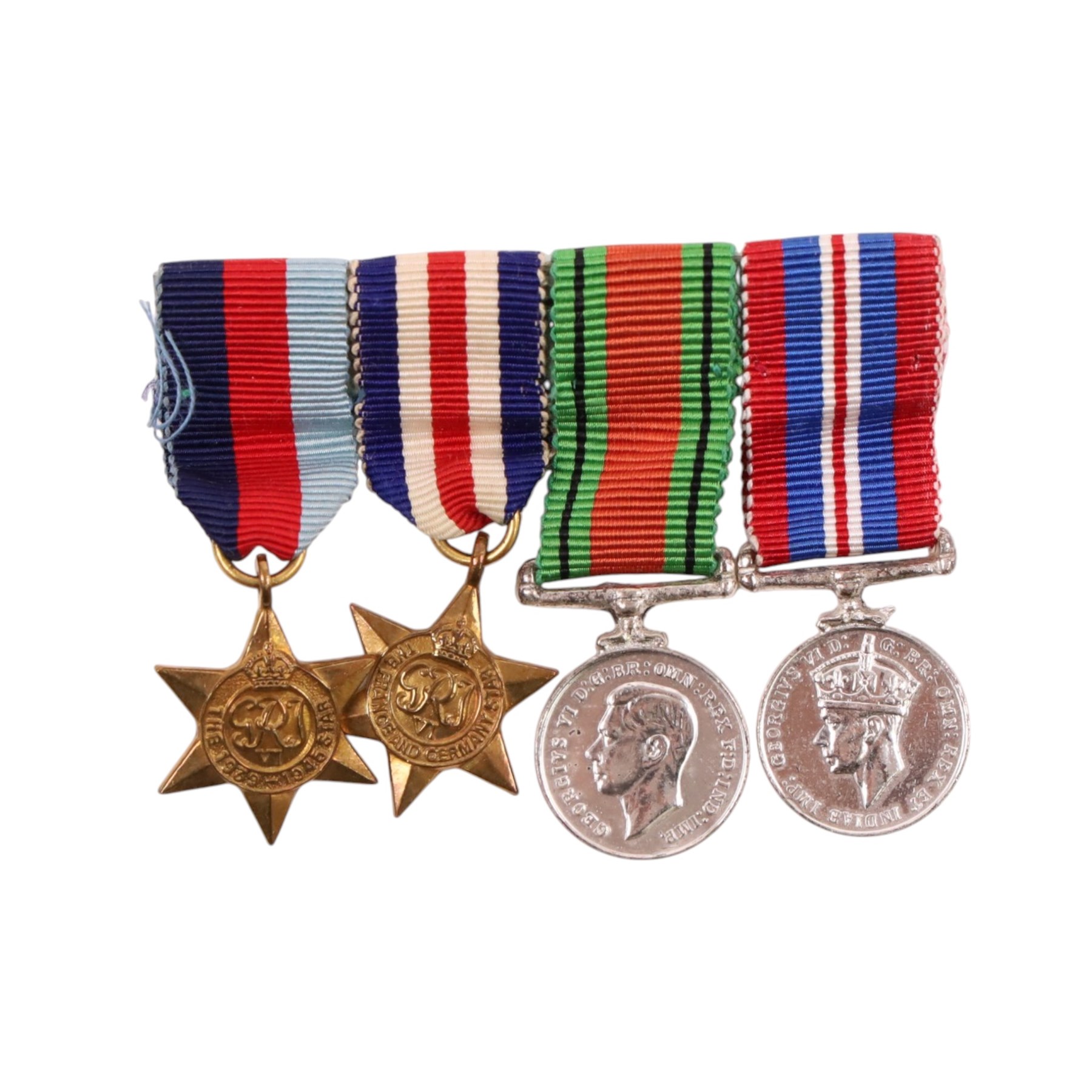 WWII British set of four medals, comprising War medal, Defence medal, 1939-45 star and France and Germany star, together with matching miniatures 
