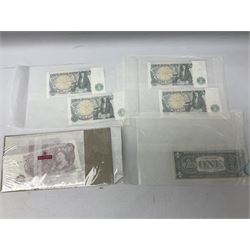 Great British and World coins, including pre decimal pennies and other denominations, commemorative crowns, Queen Elizabeth II 2002 five pound coin, four old style two pound coins, United States of America 1974 one dollar coin etc and various banknotes including Bank of England one pounds, in one box