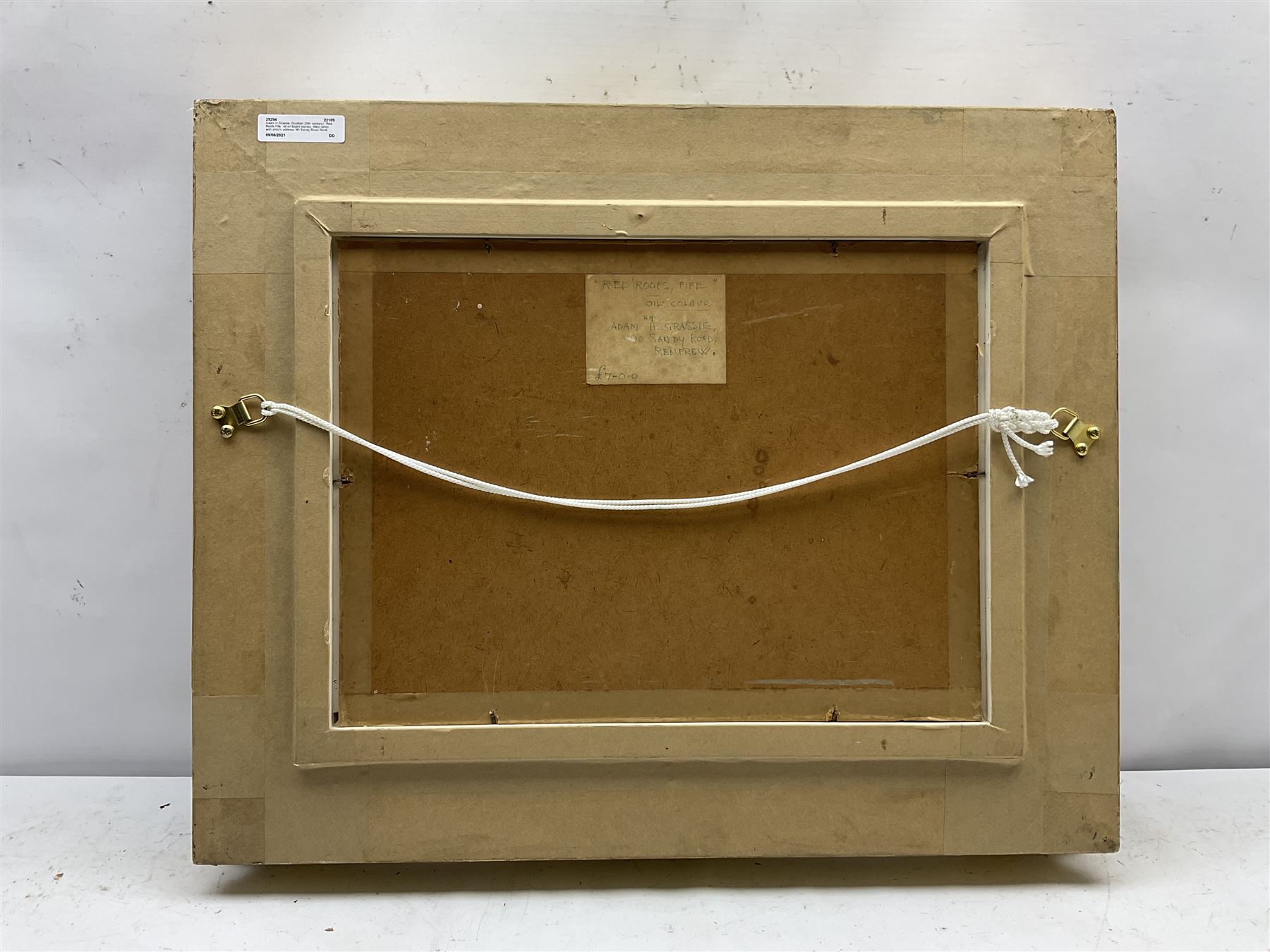 Adam H Grassie (Scottish 20th century): 'Red Roofs Fife', oil on board signed, titled verso with artist's address '90 Sandy Road Renfrew' 28cm x 39cm