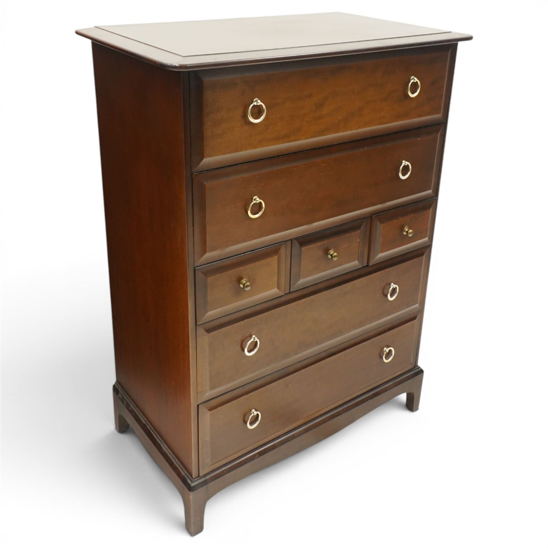 Stag Minstrel - pair of mahogany combination chests, fitted with an assortment of seven drawers with brass ring and pull handles, on bracket feet