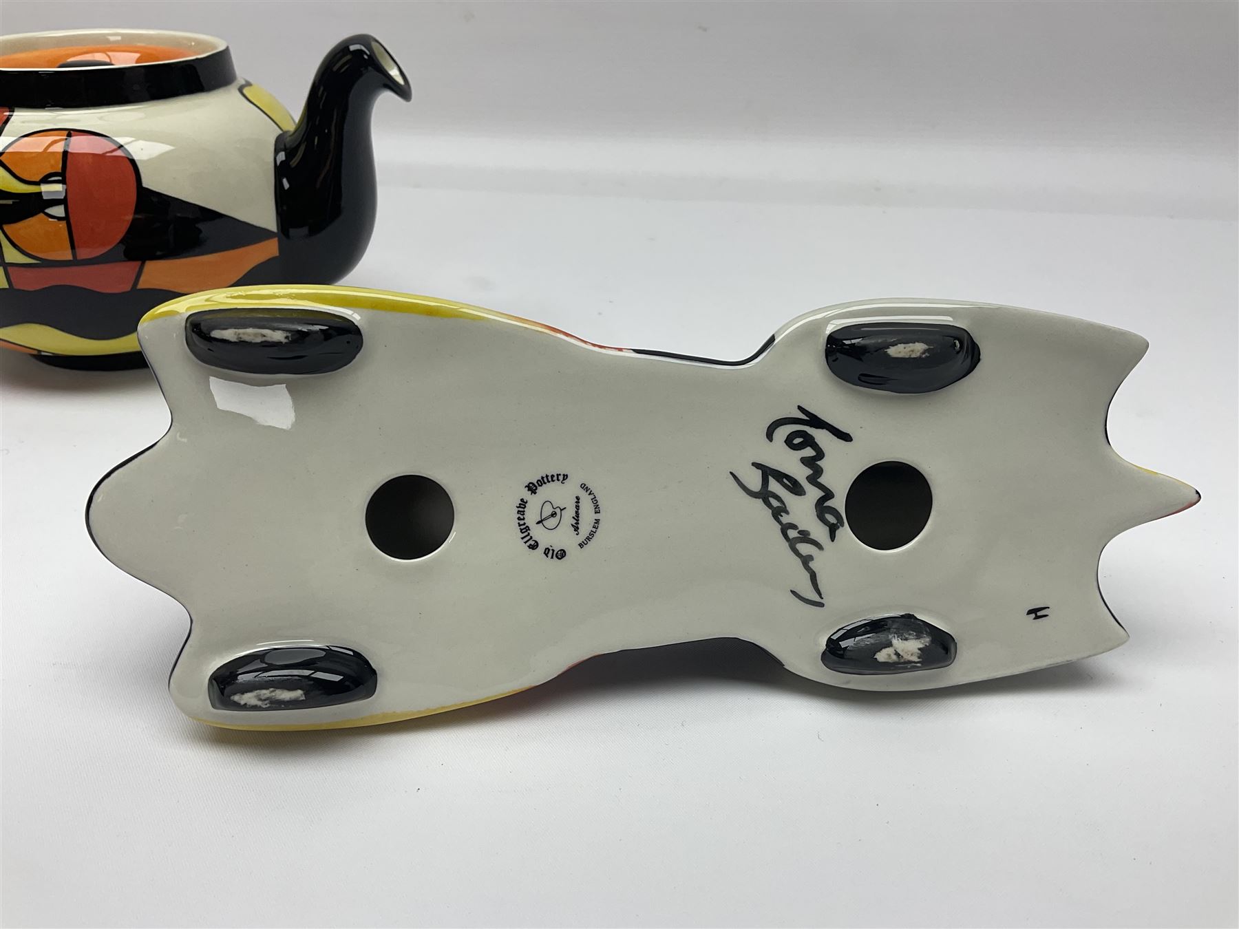 Lorna Bailey Mirage pattern teapot, together with Lorna Bailey batmobile egg cup, both signed beneath, teapot H10cm