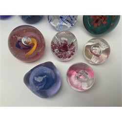Collection of paperweights to include Caithness and similar, Caithness examples including Moonbeam, Mooncrystal, Pebble, Petunias etc (22)