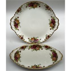 Royal Albert Old Country Roses part dinner and tea service comprising teapot, four tea cups and saucers, eight dessert plates, cake plate, cake stand, a tureen with cover, six dinner plates, an oval dish, two trinket dishes, bell and shoe decoration. 