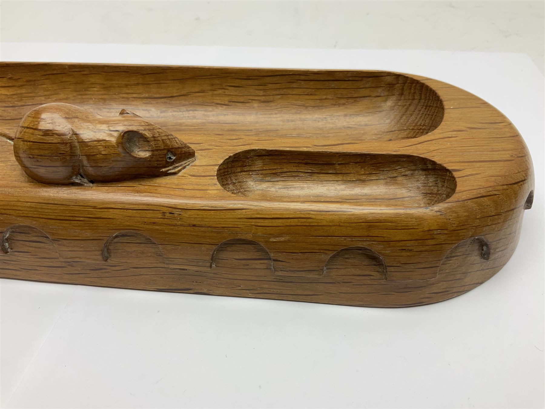 Mouseman - oak pen tray, rectangular form with rounded ends, carved mouse signature over penny moulded edge, by the workshop of Robert Thompson, Kilburn