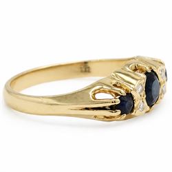 Gold sapphire and diamond ring, three round cut sapphires spaced by four single cut diamond accents, stamped 18ct