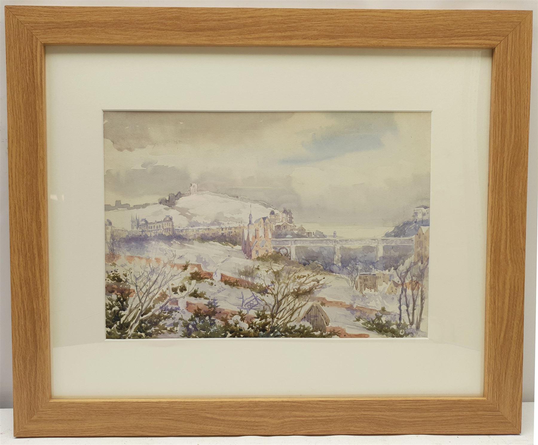 Richard Edward Clarke (British 1878-1954): 'View from Hillthorpe House (Westwood) Scarborough in Snow', watercolour signed titled and inscribed 'with Aunt Emily's love' verso 25cm x 35cm 
Notes: the view shows the Old Boys High School built as the Municipal School in 1900; an Emily Thomas is registered as living in Hillthorpe House in the Bulmer's Directory of 1890