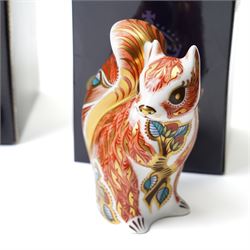 Six Royal Crown Derby paperweights comprising 'Hawthorne' hedgehog with gold stopper, baby rabbit with gold stopper, 'Molly' dog guild exclusive with gold stopper, farmyard hen with gold stopper, woodland squirrel with gold stopper, and collectors guild puppy with gold stopper, all boxed (6)