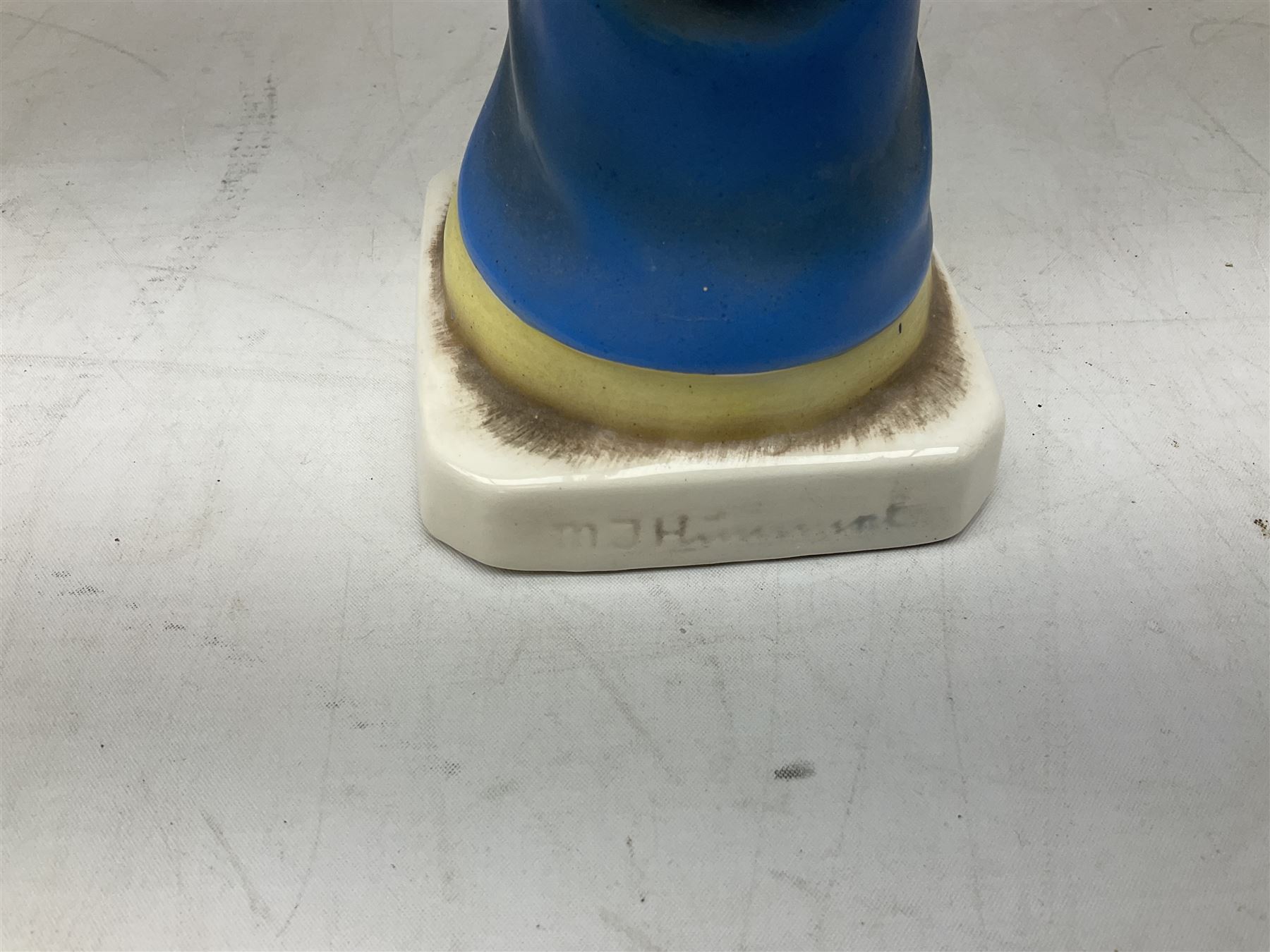 Hummel figure of a praying Saint together with a figure of a seated girl with deer, largest H40cm (2)