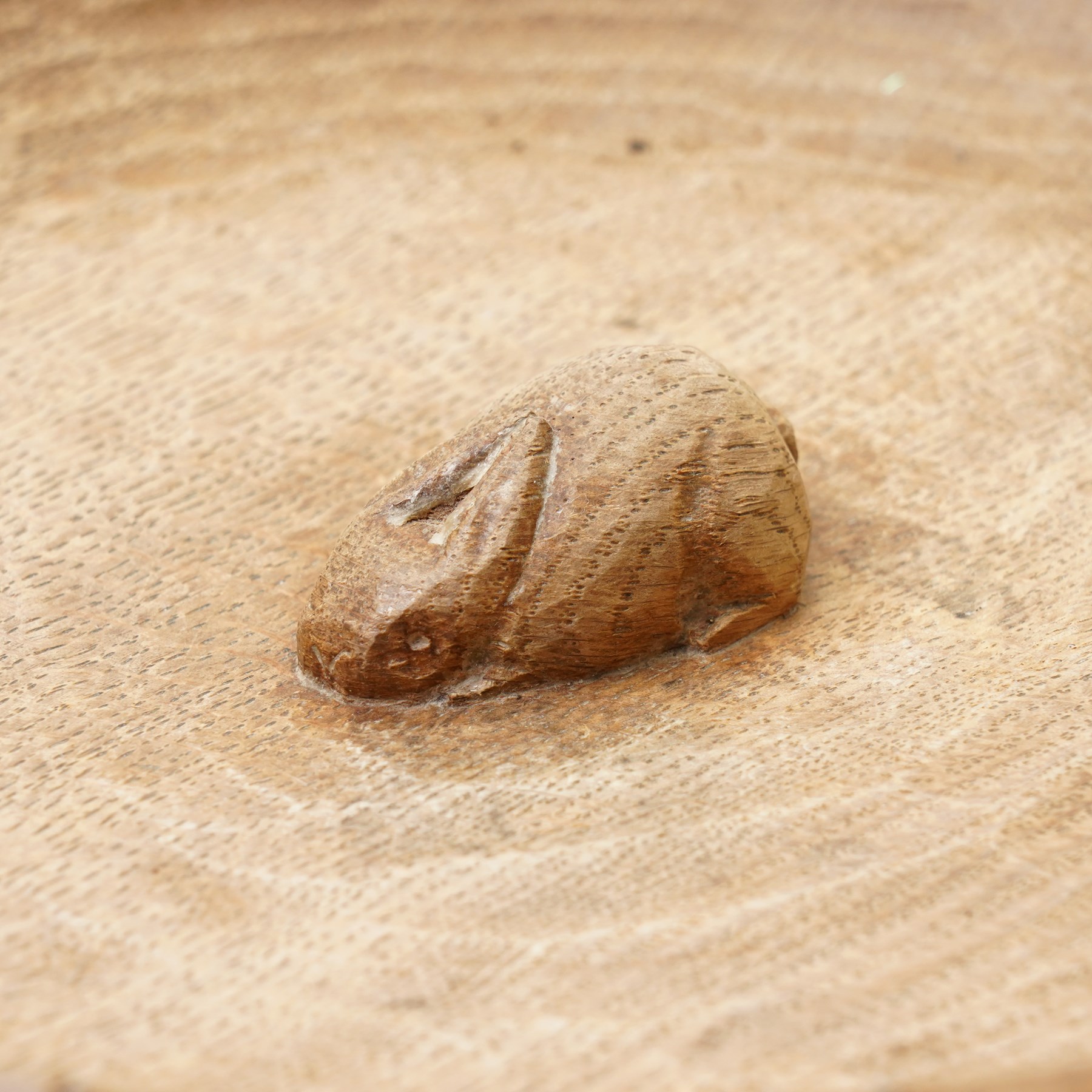 Rabbitman - oak bowl with carved rim, tooled exterior and interior with carved rabbit signature by Peter Heap of Wetwang