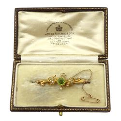 Edwardian gold peridot and split seed pearl bar brooch stamped 15ct, boxed