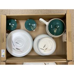 Denby part dinner service, decorated in the Greenwheat pattern, comprising dinner plates, dessert plates, side plates, lidded tureen, pair of smaller lidded dishes, sauce boat, and various serving dishes, in two boxes