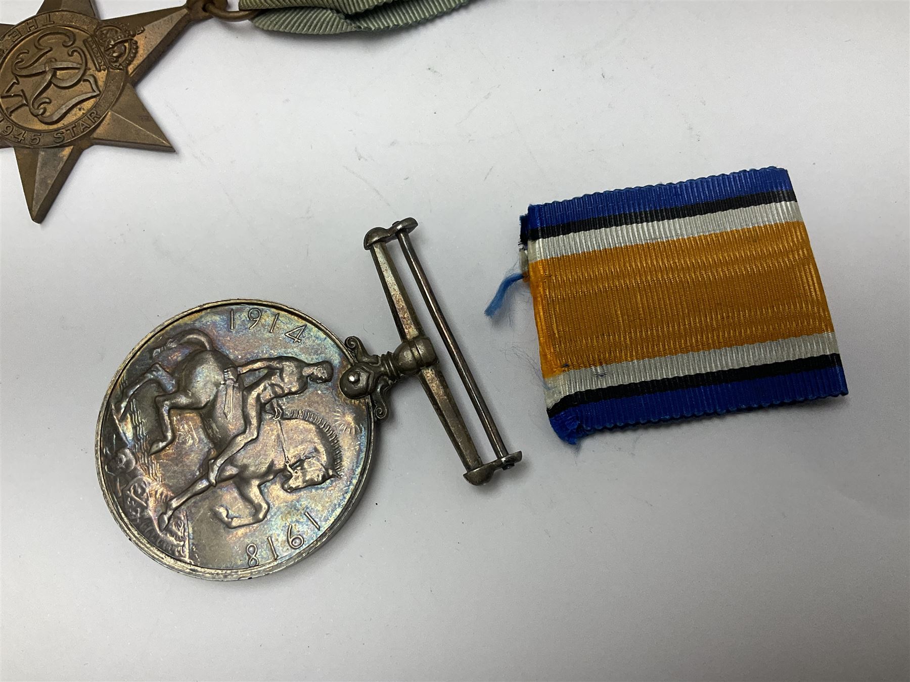 WW1 British War Medal awarded to 28885 Pte. A. Hey R. War. R.; WWI Victory Medal awarded to 7633 Pte. E. Edwards L'Pool R.; two WWII medals; Royal Navy Temperance Society Medal; Services Rendered badge No.B55177; and Home Guard lapel badge