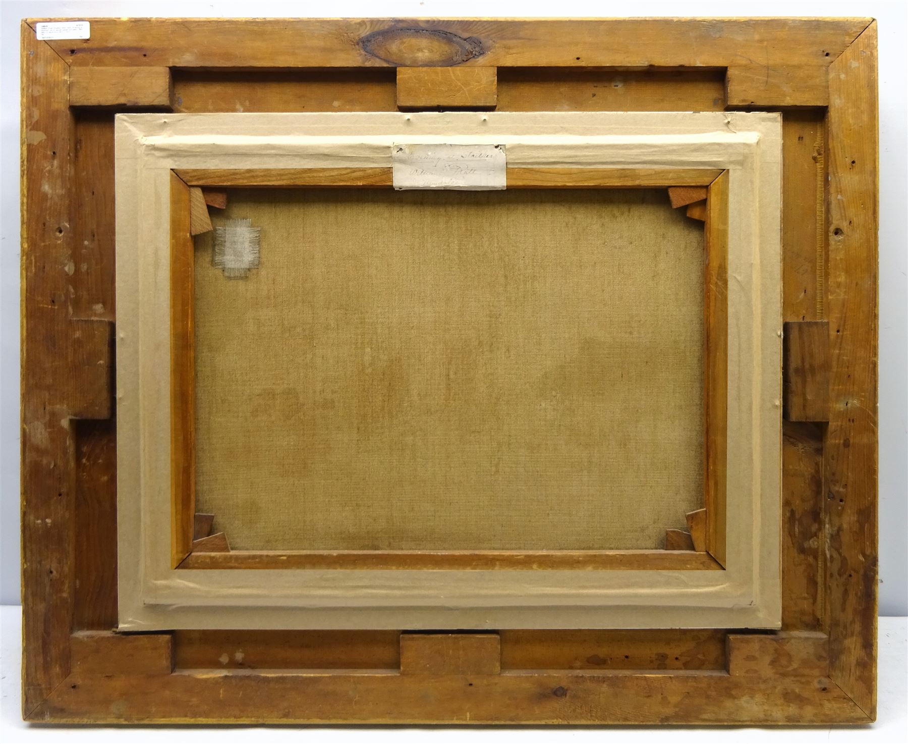 William Pratt (Scottish 1855-1936): 'Evening at Staithes' - the High Street, oil on canvas signed and dated 1909, titled on original label verso 45cm x 60cm 
Notes: Pratt seemingly visited Staithes multiple times in the early 1900s, as the companion to this picture, 'In the Shallows' (sold by Lyon & Turnbull 27/01/16, lot 536), in an identical frame and also depicting Staithes, is dated 1910. The shop in the foreground was a grocery run by Joseph Verrill, described in 1911 as 'grocer and agent for W & A Gilbey Ltd, Wine and Spirit Merchants'. He was often assisted by his two daughters, Lavinia and Hannah. The Verrills were one of the largest families in Staithes; Joseph Verrill Snr (1839-1910) was first coxswain of the Staithes lifeboat, and Isaac Verrill (1811-1895), a fisherman, was photographed by Frank Meadow Sutcliffe (1853-1941). The building became the gift shop of W & H Dean in the 1950s, and is now the Endeavour Café.