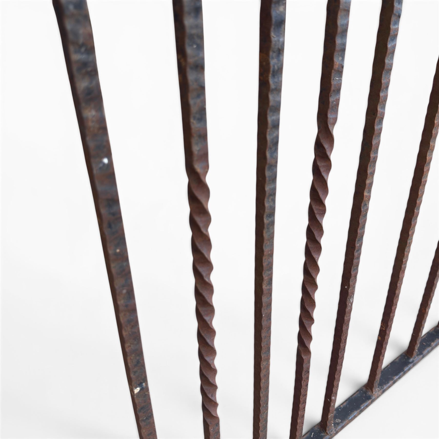 Victorian wrought iron vineyard gate, with ornate scrollwork and foliate acanthus leaf decoration, shaped cresting and central decorative panel, finished in rustic black painted finish