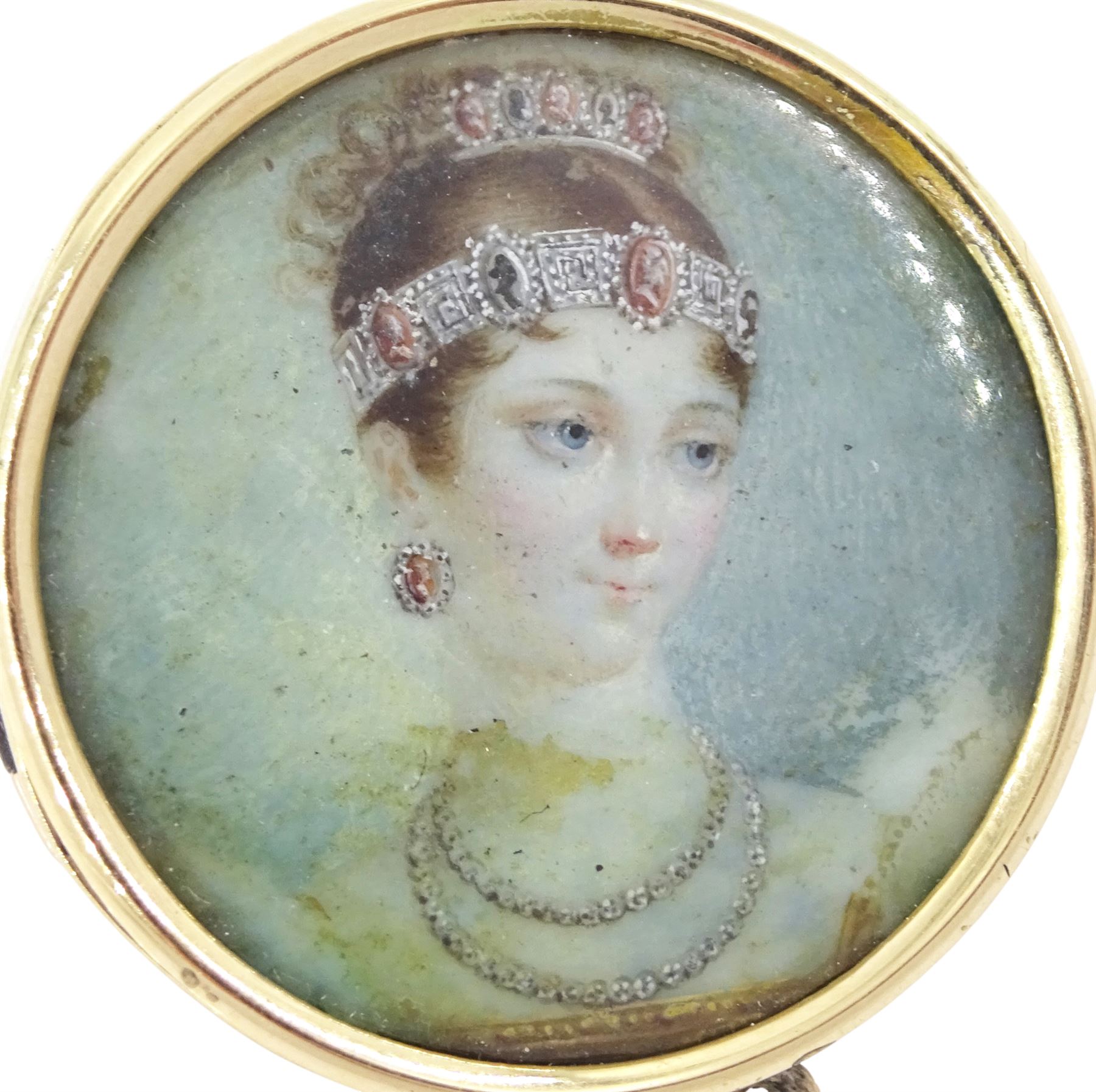Victorian gold portrait brooch/pendant, set with a circular miniature of Pauline Bonaparte on ivory, under a glazed panel, within a gold mount, the reverse inscribed 'Pauline Bonaparte, B.Q.J, April 22nd 1891'. This lot has been registered for sale under Section 10 of the APHA Ivory Act