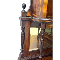 Late 19th century inlaid rosewood free standing corner display cabinet, the upper section featuring a mirrored panel above an inlaid cupboard with a felt-lined interior, complemented by a recessed open compartment with a mirrored back, the base with a glazed door enclosing two felt-lined shelves, on turned supports