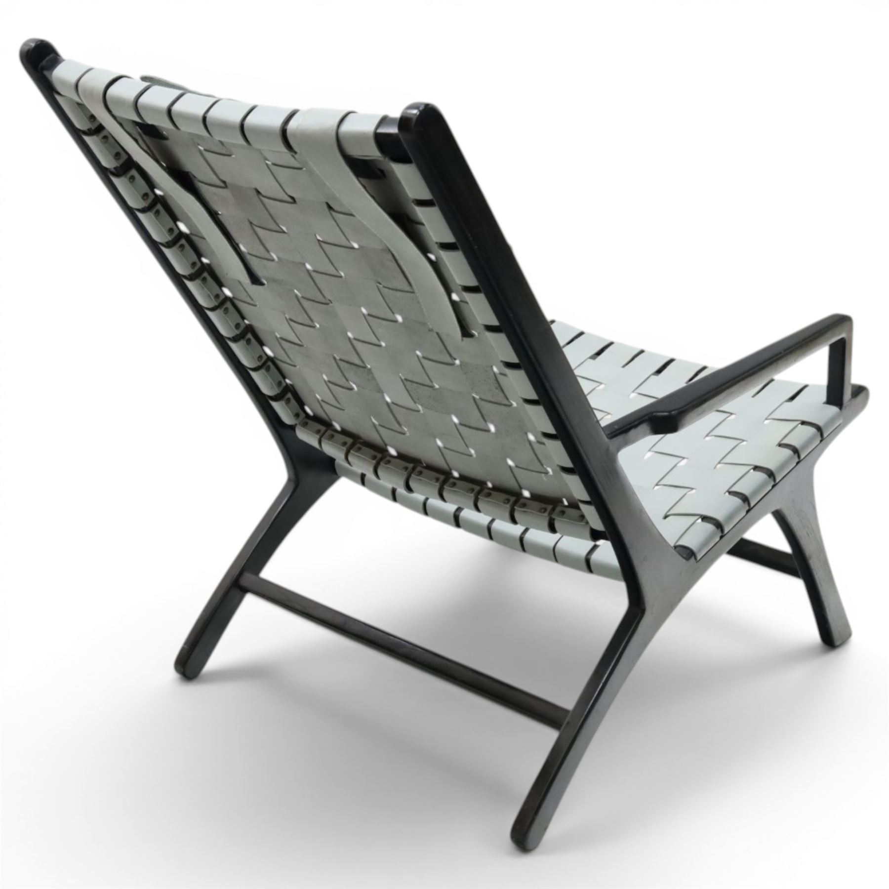 Kendari - Mid 20th century style armchair, grey woven leather seat and back, raised on an ebonised teak wood frame