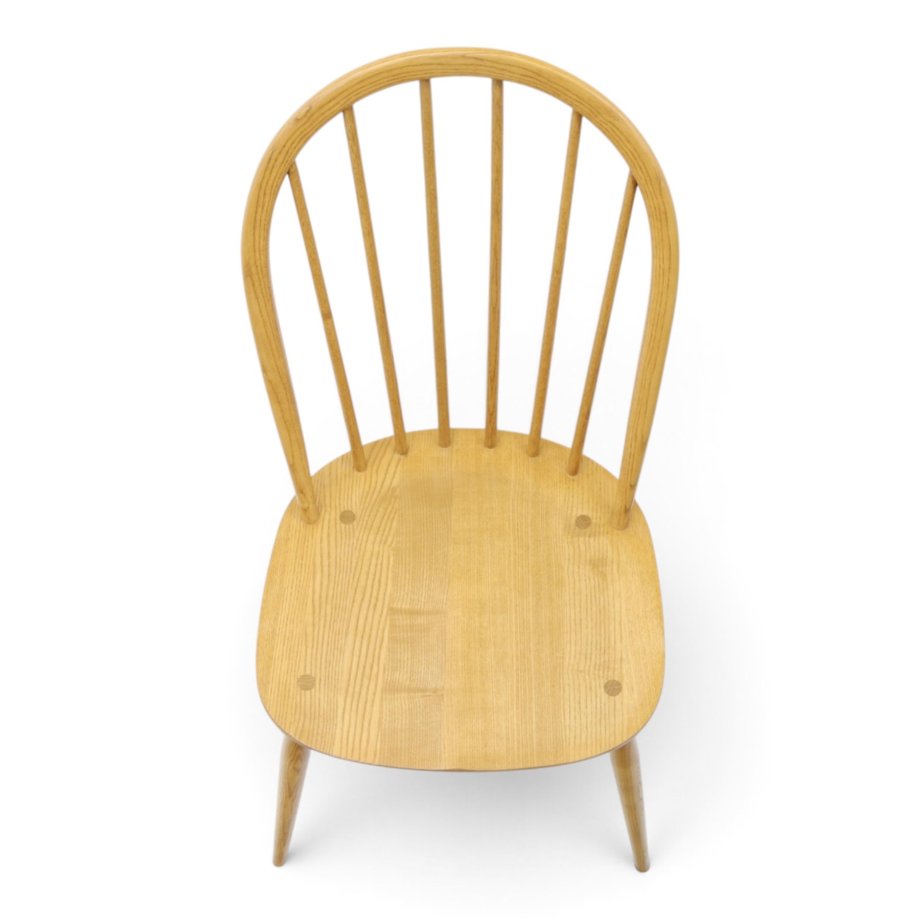 Ercol - pair of 'Windsor' dining chairs, with high hooped back, blue seat cushions with studded, tapered supports  
