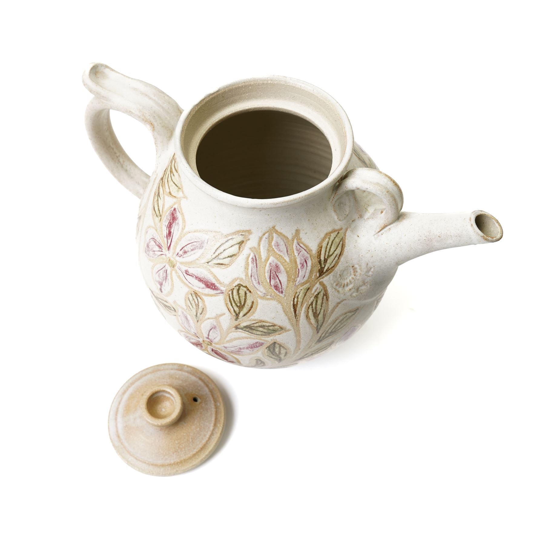 John Egerton (c1945-2024): studio pottery teapot, decorated with foliage and flowers on a cream ground, with impressed ammonites to the handle and spout, marked beneath, H28cm