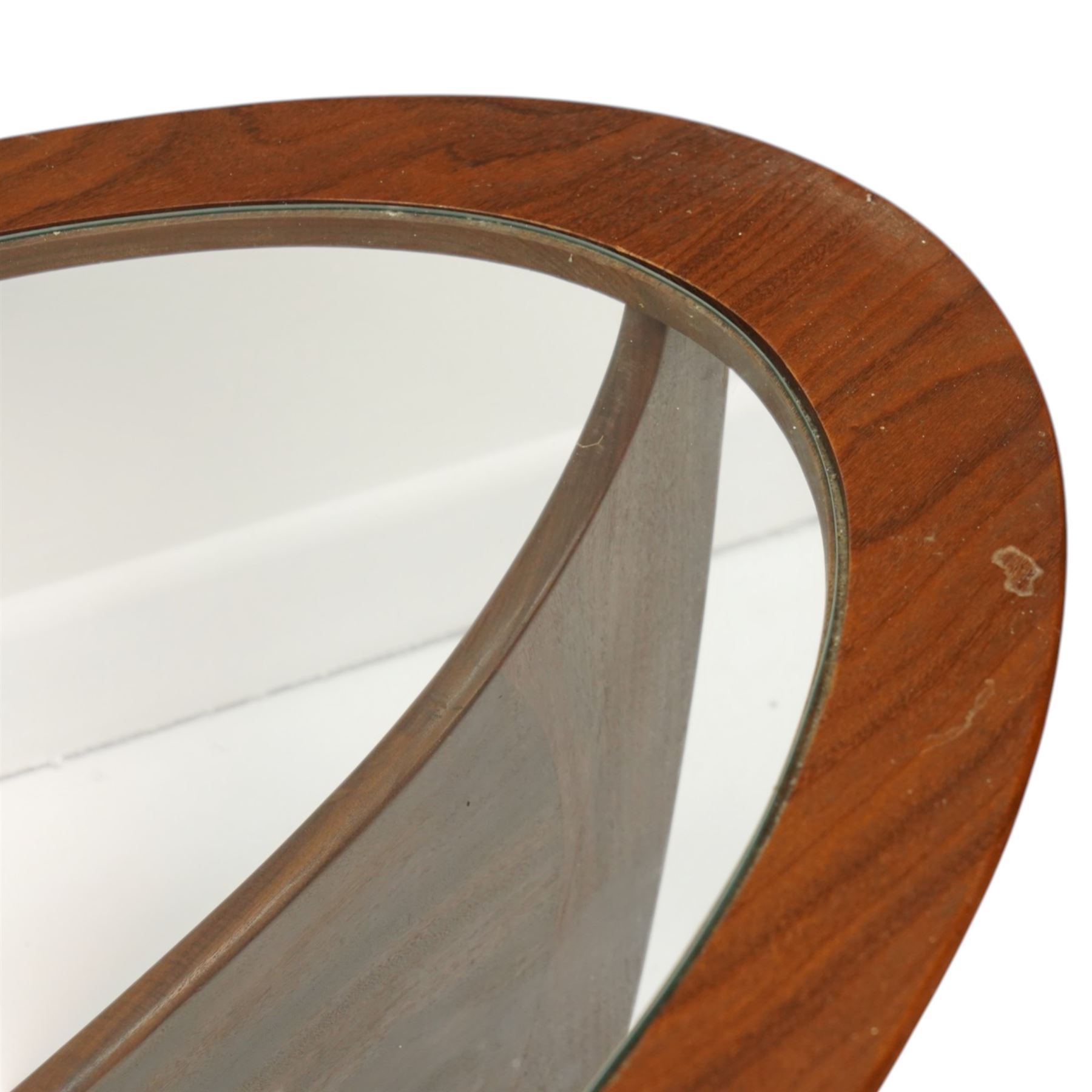 Ib Kofod-Larsen (1921-2003) Astro for G-Plan - teak Astro coffee table, oval form with inset glass top