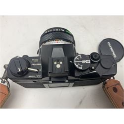 Olympus OM-2 camera body, serial no 1117526, with Olympus OM-System Zuiko Auto-W 28mm 1:2.8'  lens serial no 336591, Olympus OM10 camera body serial no 2392257, with Olympus OM-System Zuiko Auto-Macro 50mm 1:3.5' lens serial no 225784, Soligor C/D mirror lens 1:8 f=500mm' serial no 784035650 together with other camera equipment 