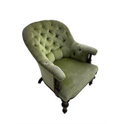 Victorian mahogany framed armchair, upholstered in buttoned sage green fabric with sprung seat, raised on turned and fluted front supports with matching arm terminal column supports