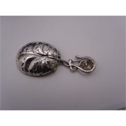 Unusual Victorian silver caddy spoon, the oval parcel gilt bowl embossed with leaf, leading to a flower head mounted tendril handle also detailed with leaf, hallmarked Hilliard & Thomason, Birmingham 1853, L8.5cm, approximate weight 0.49ozt (15.3 grams)