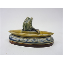  George Tinworth (British 1843-1913) for Doulton Lambeth, stoneware model of a Frog in a Canoe, impressed and incised marks, L12.5cm   