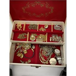 Two Klaus Kobec Entourage gentleman's and ladies, bicolour stainless steel quartz bracelet wristwatches, round white dials with Roman numerals and date apertures, both boxed, silver charm bracelet, silver jewellery and other costume jewellery