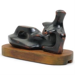 After Henry Moore (British 1898-1986): 'Reclining Figure', terracotta maquette sculpture, base marked with affixed catalogue label inscribed ‘Reclining Figure: 1939 Archive 0074229', W20cm H12cm
Notes: the original is on display at the Tate Britain