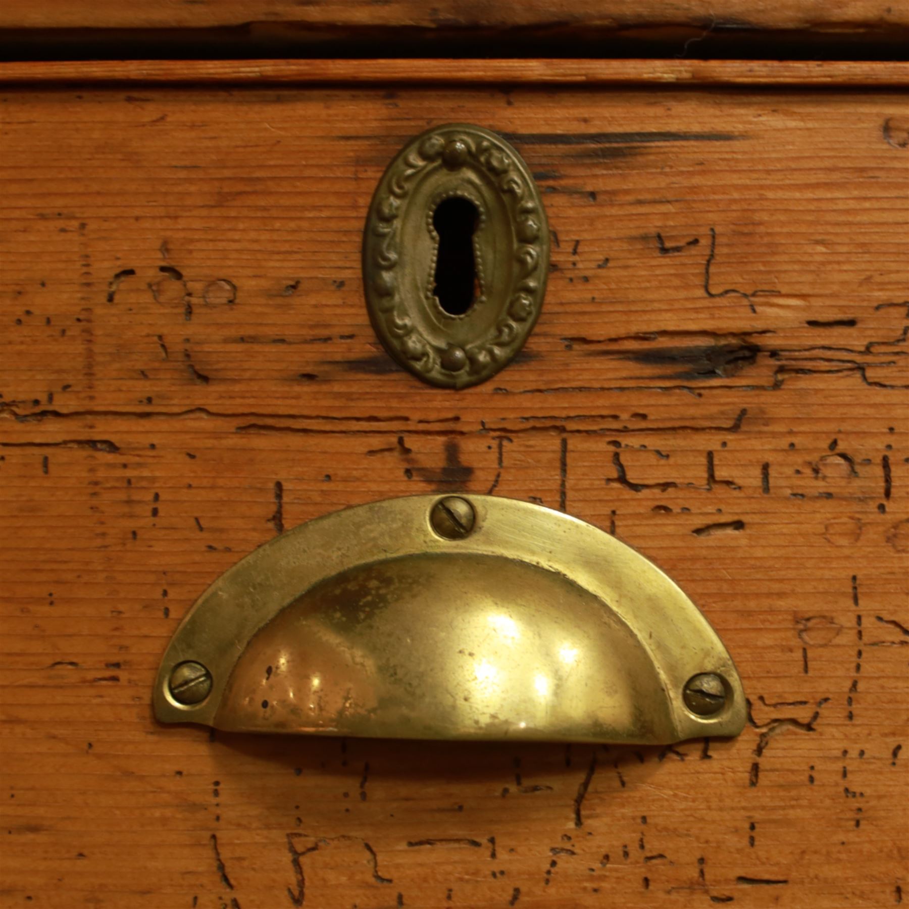 Victorian stripped pine kitchen cupboard, of rectangular form with fluted cornice and top section with two panelled cupboard doors revealing painted shelved interior, middle with two drawers with turned knob handles and brass cup handles, base section with two panelled cupboards, raised on shaped bracket feet 