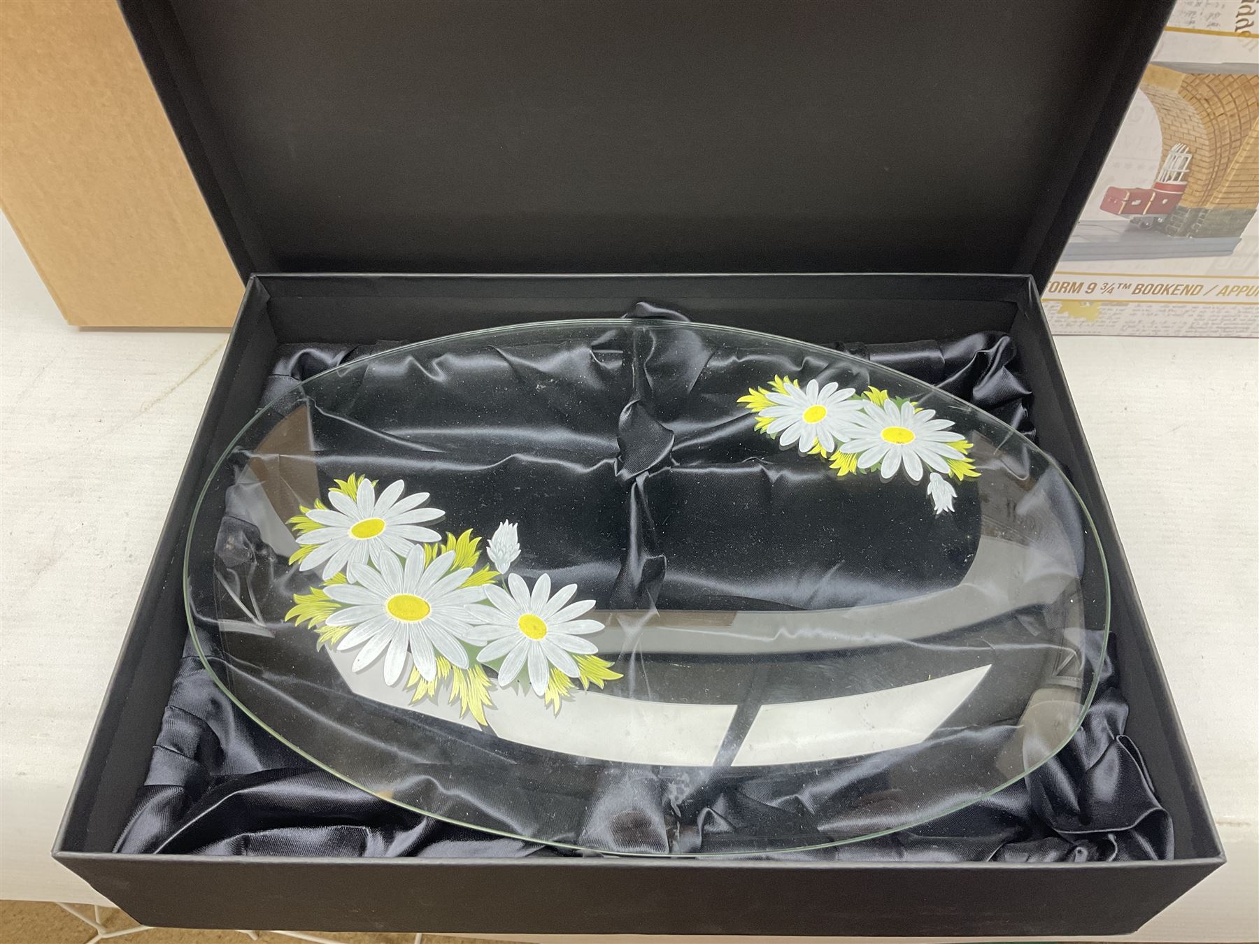 Dolls of the world, together with glass decanters, tea wares and other collectables, in two boxes 