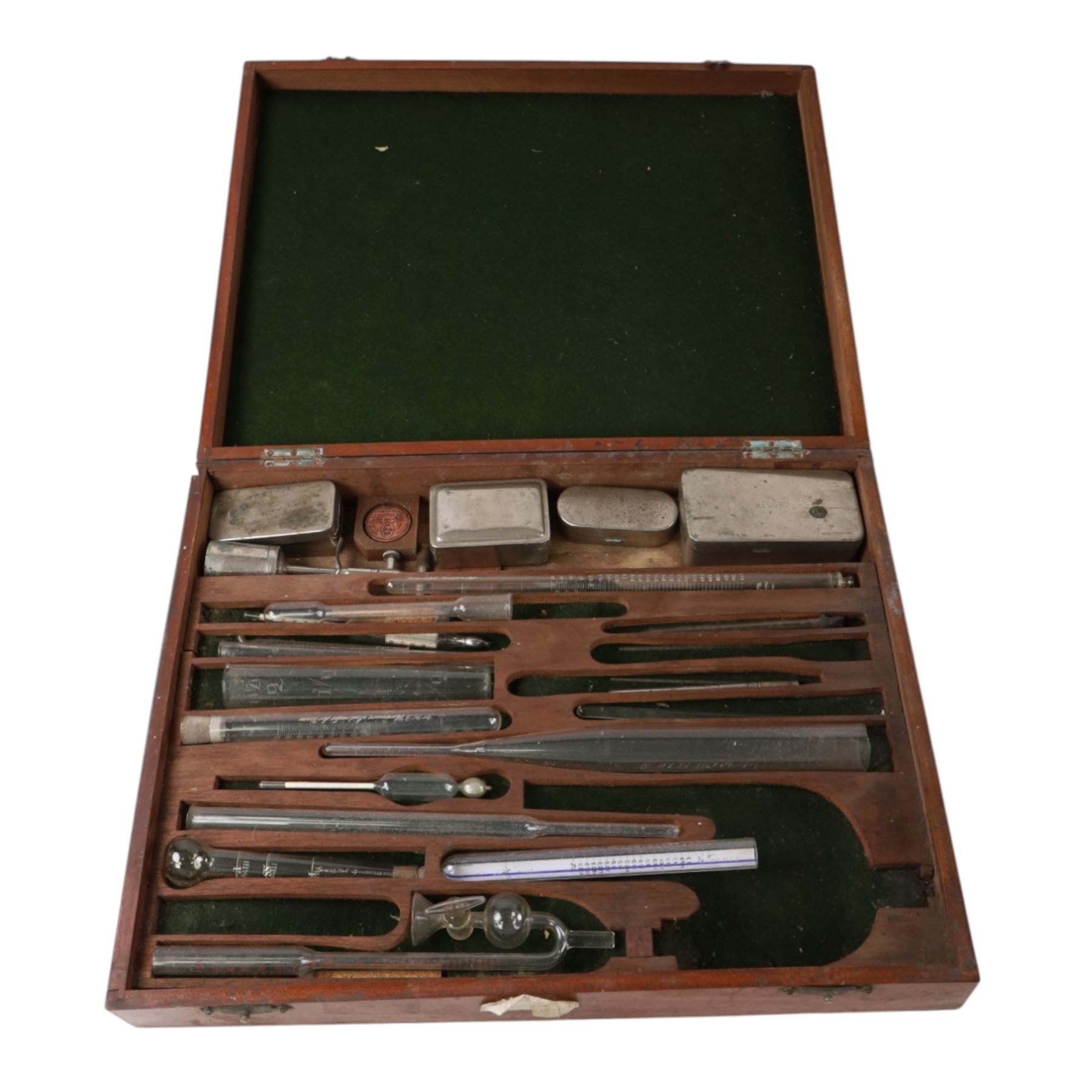 Medical instruments, including glass thermometers, unicometer, sulfatometer, ammonia meter, acidimeter for urine, albumenometer, sacchanometer, syringes etc, contained within wooden box