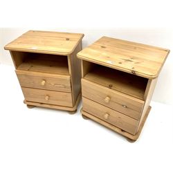 Pair solid pine bedside chests, moulded top, two drawers, bun feet