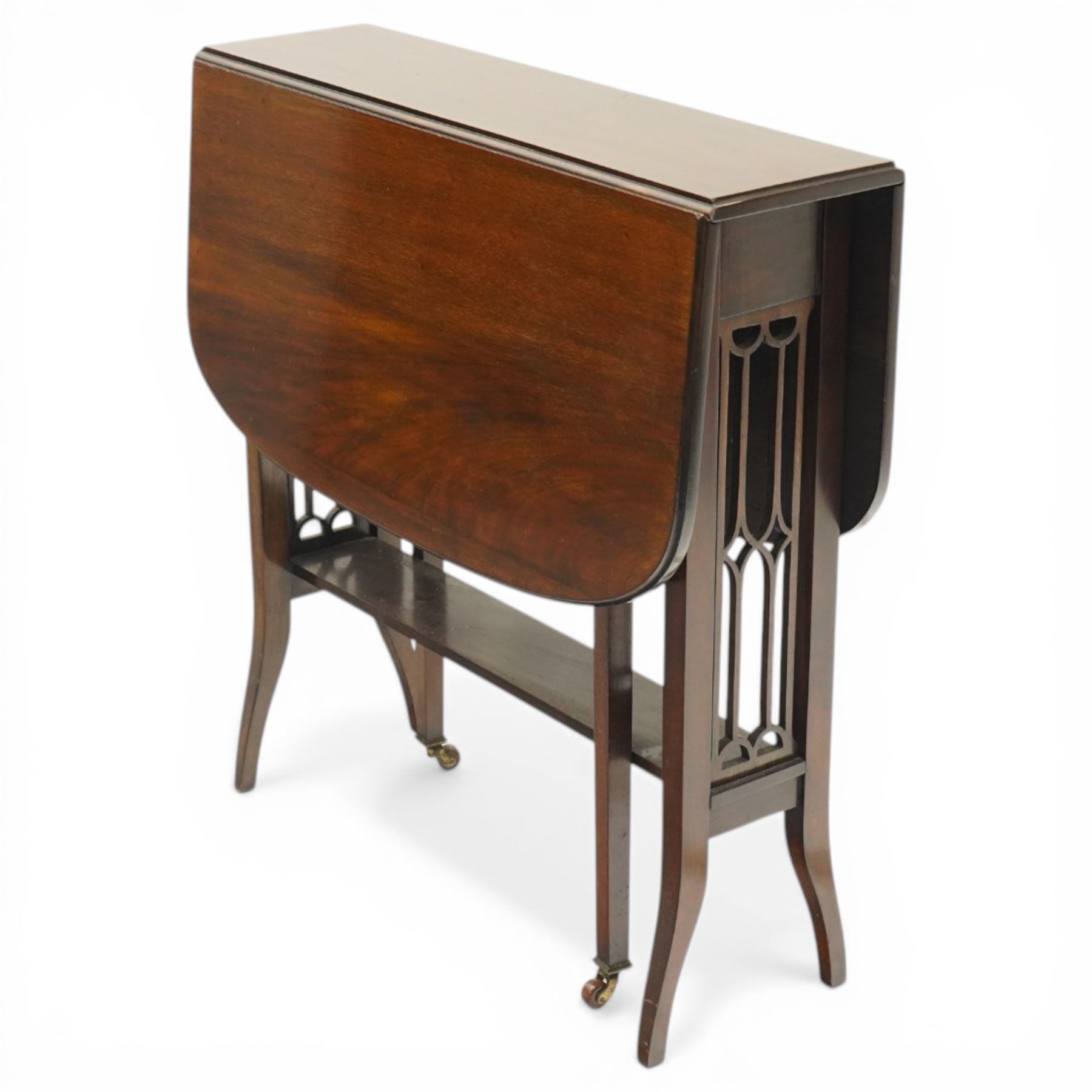 Edwardian mahogany Sutherland table, rectangular drop-leaf top with rounded corners, raised on gate-leg base with pierced end supports