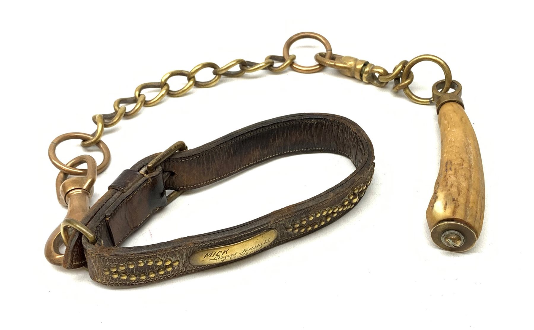 A 19th century leather and brass studded dog collar with brass plaque for Mick, Lancs Hussars 4th Troop, on bronze chain with antler handle 