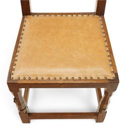Mouseman side chair- panelled adzed back over tan leather upholstered seat with studwork, on octagonal front supports united by stretchers, each with signature carved mouse, by the workshop of Robert Thompson, Kilburn