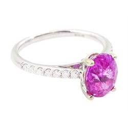 18ct white gold pink sapphire and diamond ring, single oval cut sapphire of approx 2.80 carat, with round brilliant cut diamond shoulders, hallmarked