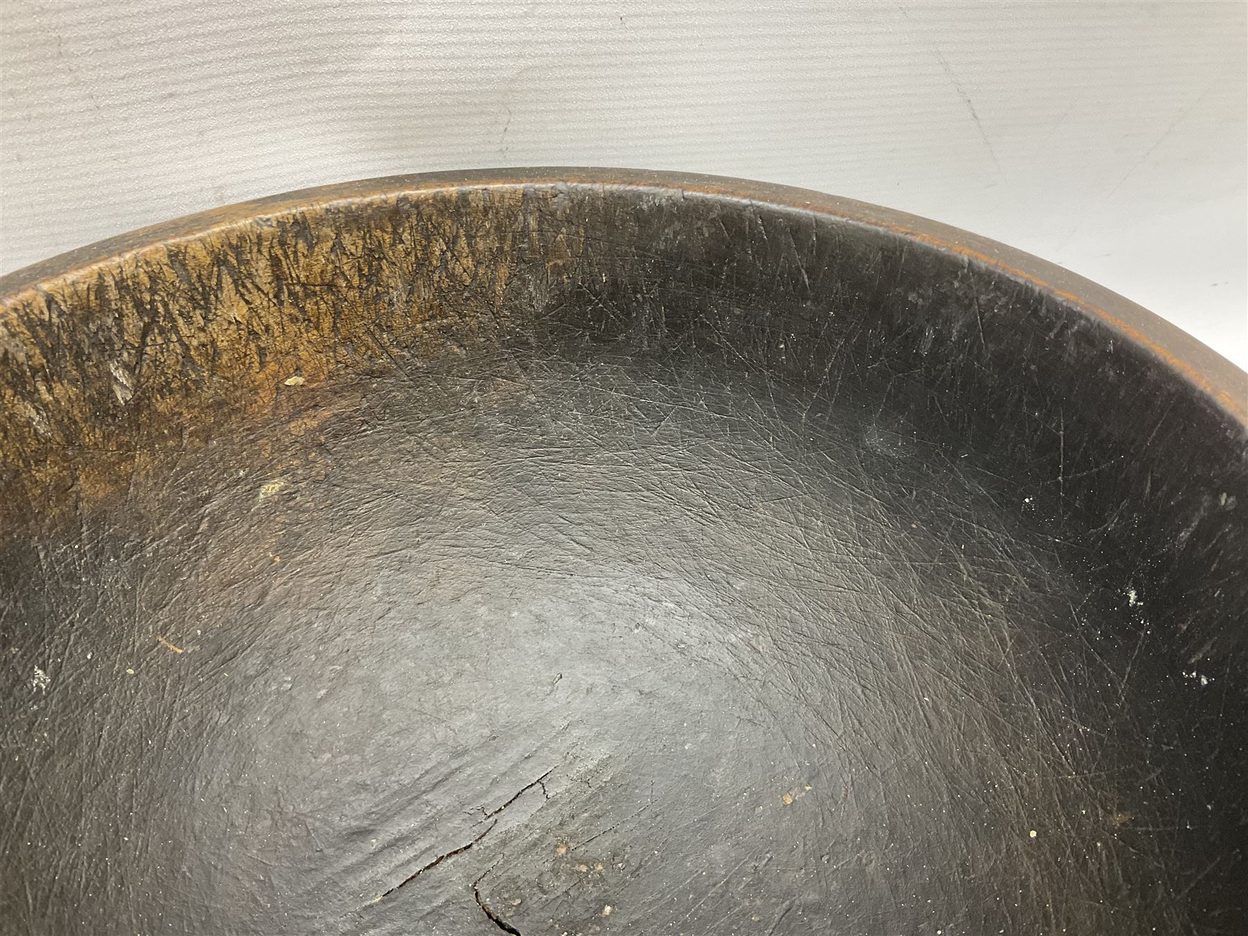 19th century pole lathe turned sycamore bowl, the interior housing lead liner, the exterior decorated with bands of deep grooves, D28cm