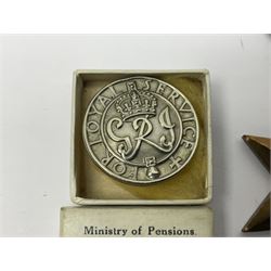 WWII group of five medals comprising 1939-45 War Medal, Defence Medal, 1939-45 Star, Africa Star and France and Germany Star on wearing bar; WWI British War Medal awarded to 142019 Pte. A. Thompson A.S.C.; and boxed King's Badge 'For Loyal Service'
