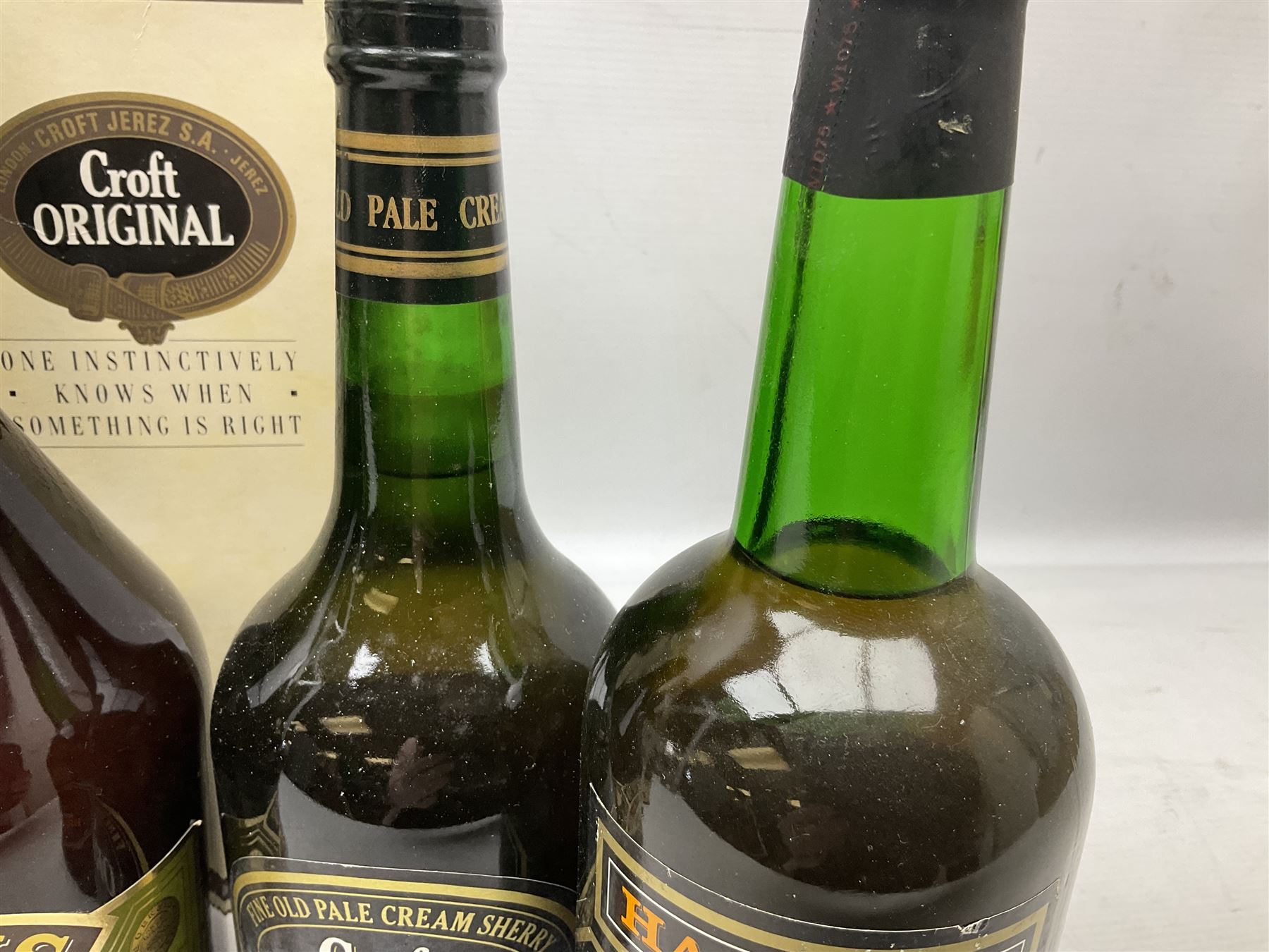 Mixed alcohol comprising Harveys Medium Dry Sherry, 70cl, one bottle, Croft Original Fine Old Pale Cream Sherry, 70cl, one bottle in box, Martini Extra Dry Vermouth, 90cl 18% vol, one bottle in box, Cockspur Barbados V.S.O.R Fine Rum, one bottle, and Baileys Irish Cream, 1l, one bottle (5)
