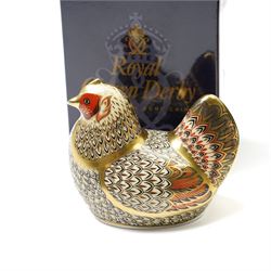 Six Royal Crown Derby paperweights comprising 'Hawthorne' hedgehog with gold stopper, baby rabbit with gold stopper, 'Molly' dog guild exclusive with gold stopper, farmyard hen with gold stopper, woodland squirrel with gold stopper, and collectors guild puppy with gold stopper, all boxed (6)