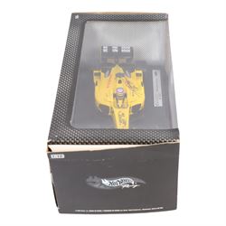 Three signed limited edition 1:18 scale Formula One models, comprising Hot Wheels Jordan EJ12 signed by Takuma Sato, Hot Wheels Jaguar Racing R2 signed by Eddie Irvine and a Minichamps Williams F1 Team model signed by Jenson Button, 1:18 scale model, all boxed