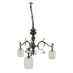 Art Nouveau copper three branch chandelier, turned central column with foiliate collar, is...