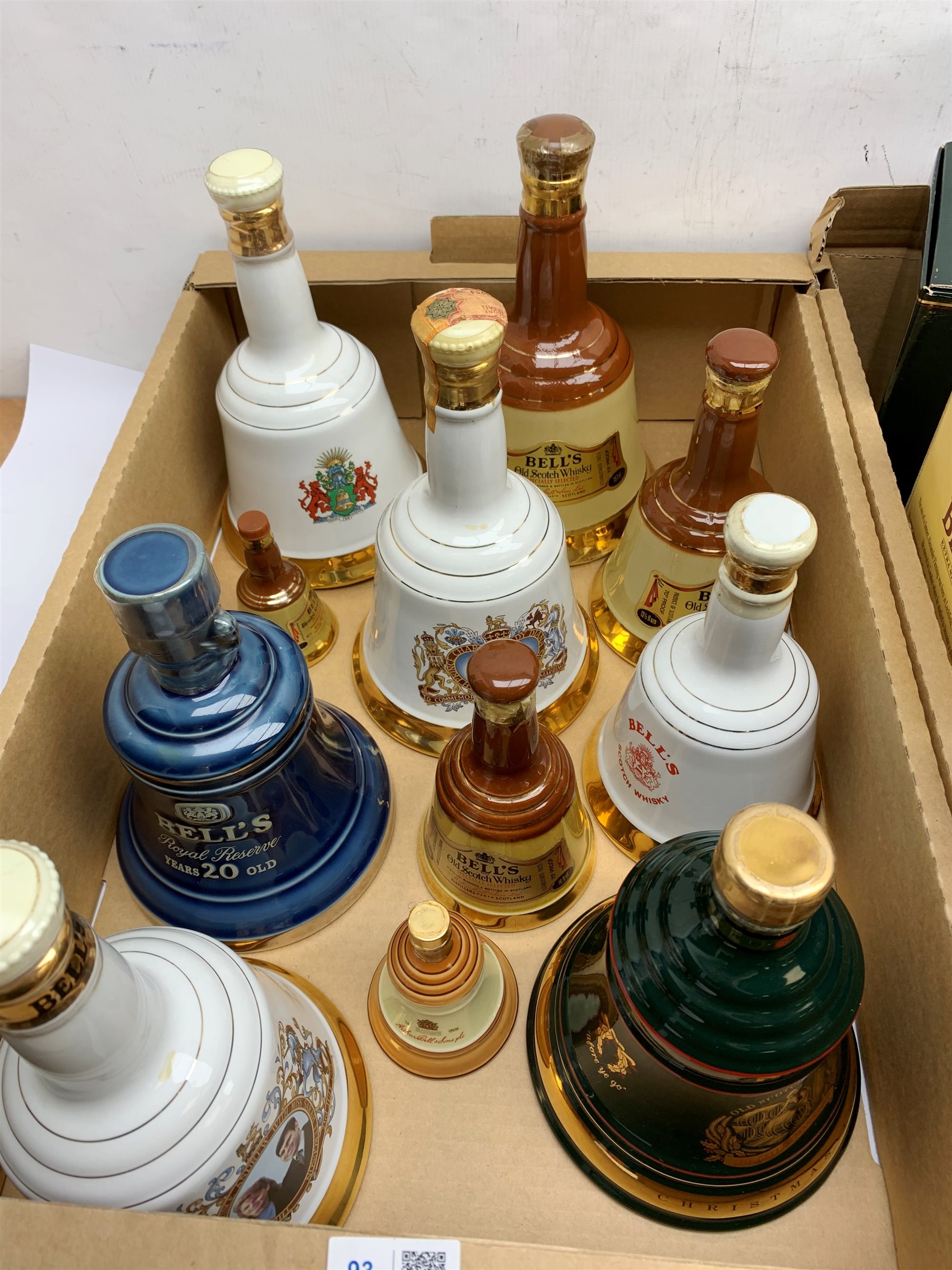 A collection of various Bell's Whisky decanters, to include three Royal