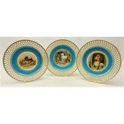  Set of three late Victorian Minton cabinet plates hand painted with Dog groups after Edwin Landseer, by Henry Mitchell, on turquoise ground within a pierced gilt basket weave border, two initialed 'HyM' with T. Goode & Co. retail stamp, c1879, pattern no. G739, D25cm (3) Provenance Property of Bob Heath, Brandesburton Formerly of Ravenfield Hall Farm near Rotherham  