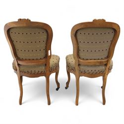 Set of four Victorian walnut framed salon chairs, upholstered in olive fabric with diamond embossed tufts